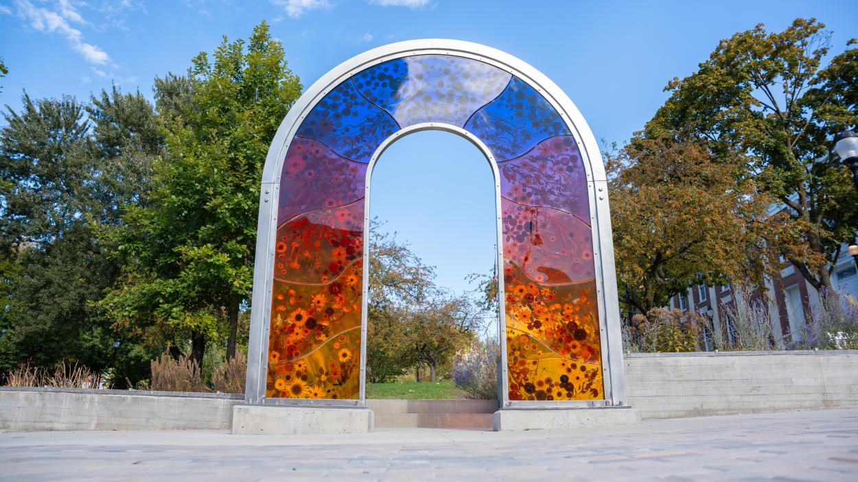 a phot of anthology by lydia kern, a multicolored acrylic and steel arch installation