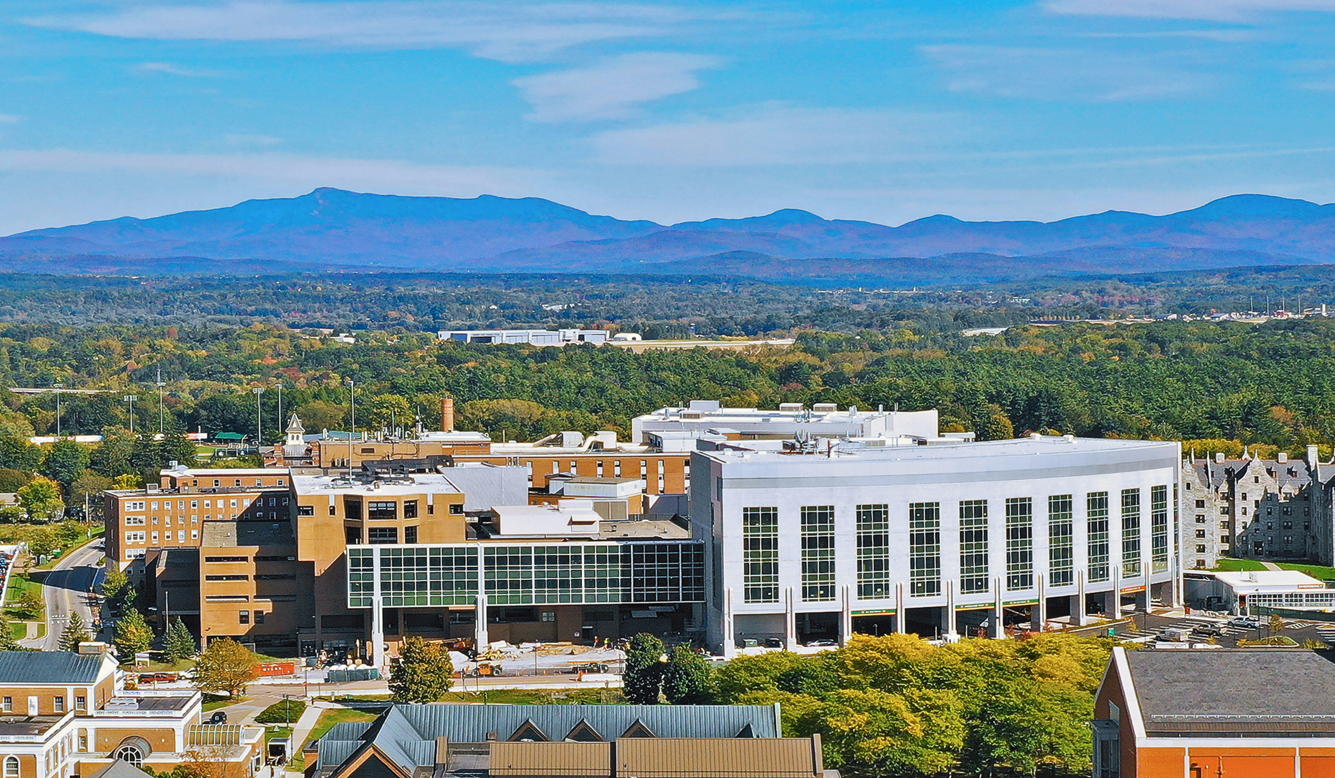 An overview image of UVM Medical Center with the Green Mountains in the background.