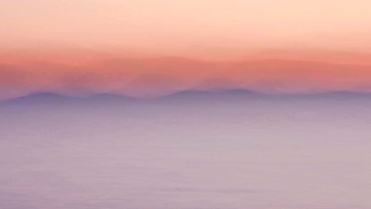 A painting of abstract undulating mountains in soft shades of purple, with an ombre peachy pink sky above