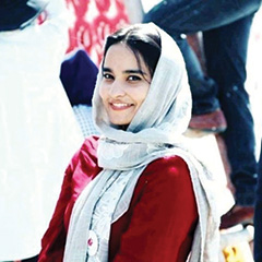 An image of a woman wearing a headscarf.