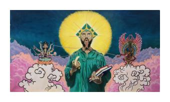 A painted mural titled The Assimilation of Emmanuel, depicting a dark skinned man wearing an emerald green graduation gown and motor board cap, with his gaze turned upward and his mouth open. His tongue is made of braided strands which are unraveling and held by a deity with six arms and three faces on one side, and another with the face of a dragon and multi-colored wings on the other. A corona of golden light frames his head, with the rays forming a crown.