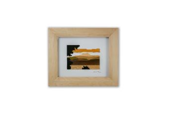 The use of wood the create the image of Camel's Hump from the lake.