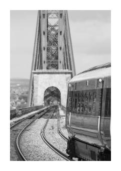 inkjet print of a train on a bridge