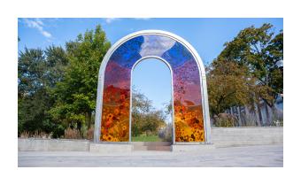a phot of anthology by lydia kern, a multicolored acrylic and steel arch installation