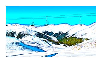 A photograph of a view of a ski mountain, with ski lift lines in view, where the white of the snow overtakes the scenery -- the sky is a flourescent blue. 