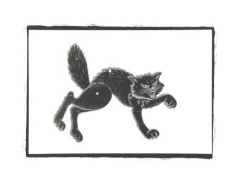 B&W photograph of a Halloween cat decoration.