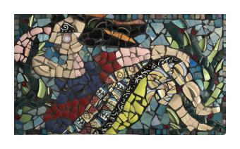 Colorful ceramic mosaic depicting a woman reclining. 