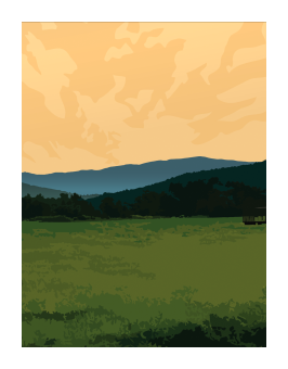 Green clearing in front of a blue mountainscape with an orange sky. 