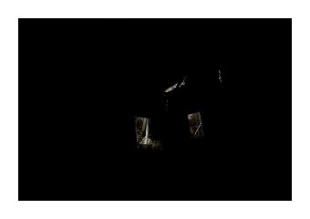 Photograph of a darkened house where the only imagery that invokes a house is the light coming through the windows from inside. 