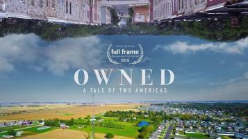 A landscape with green and yellow fields and clusters of houses, with sky above and an upside down cityscape above. Owned