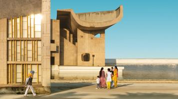 An image of people juxtaposed by uniquely designed buildings.