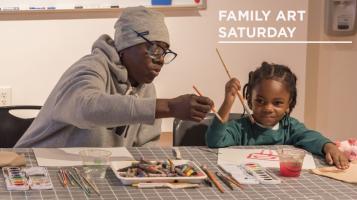 Adult and child making art together at BCA.