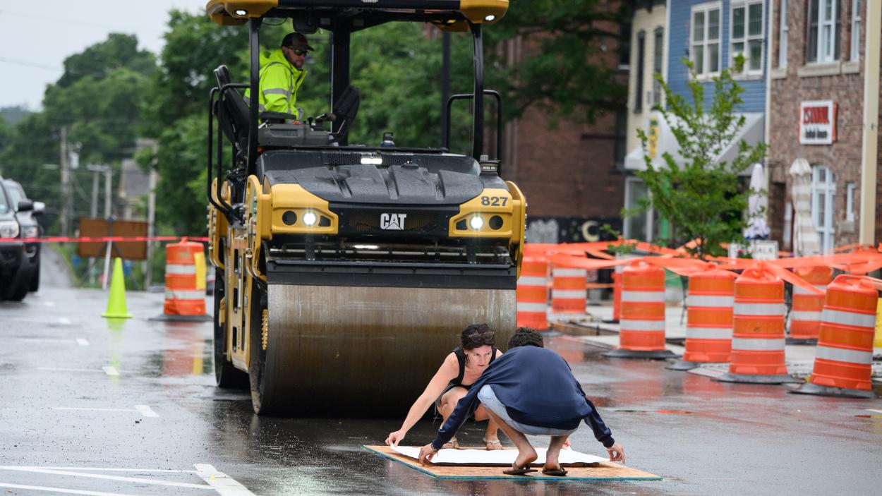 Steam roller rolls over art